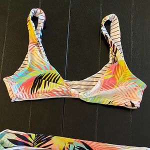 Reversible Ripcurl Swimsuit. Size Med.